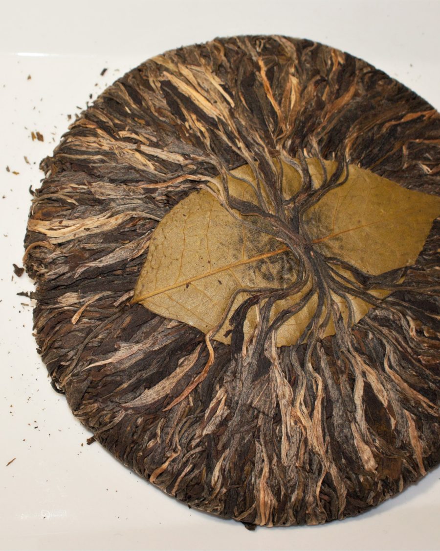 Pu-erh tea cake, compressed dark tea leaves
